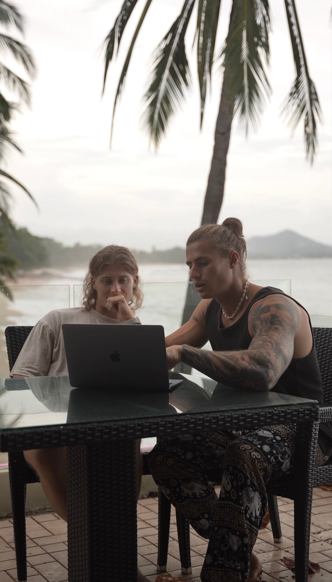 Timon and Jack working together by the water